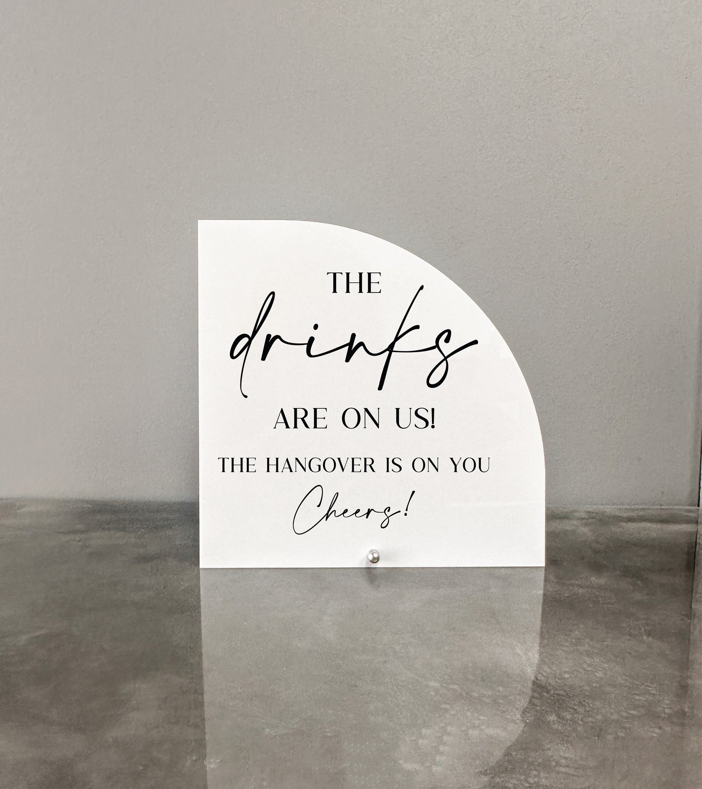 The Drinks Are On Us Sign