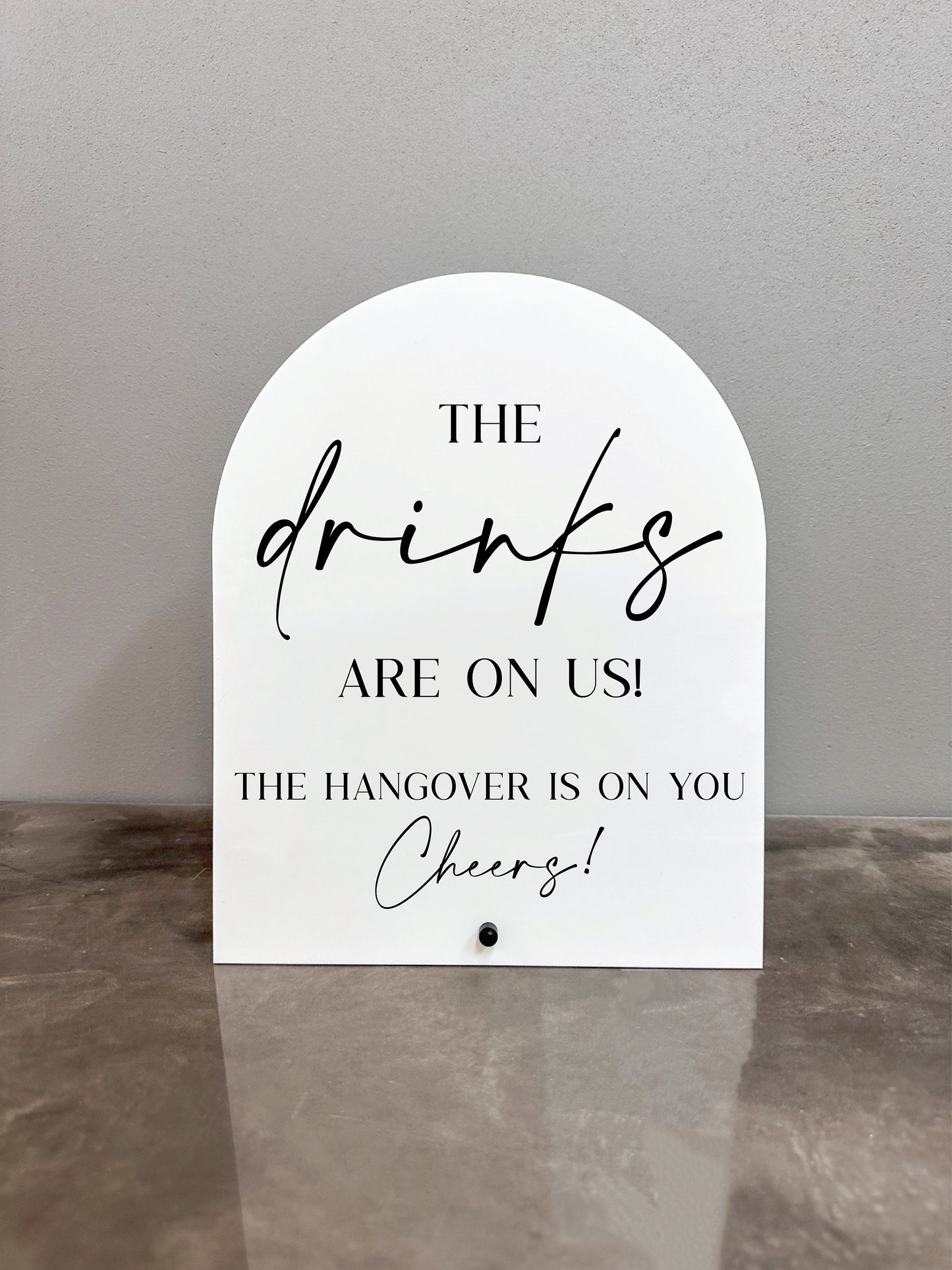 The Drinks Are On Us Sign